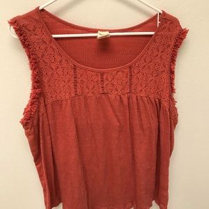 Rust colored sleeveless top